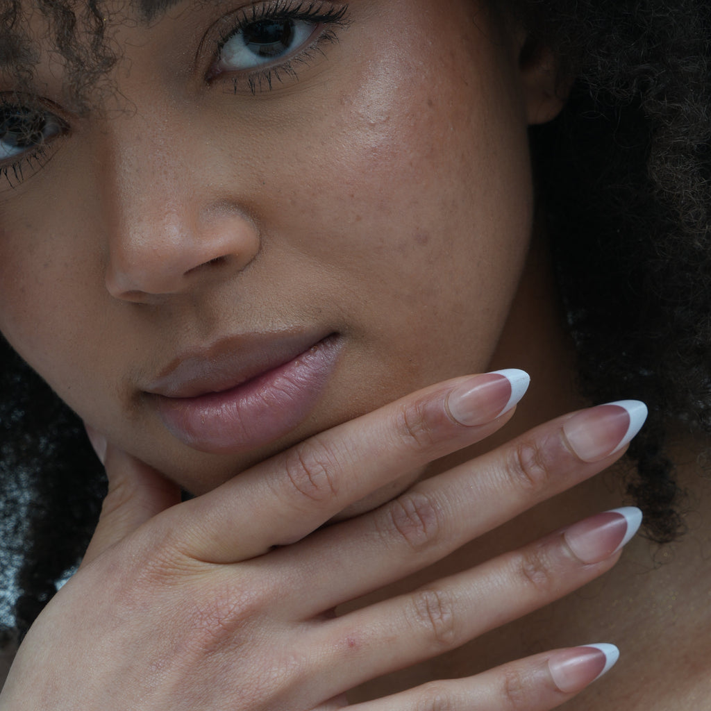 French manicure press-on nails by Ma boutique, featuring a soft gel finish and elegant design in a variety of lengths.