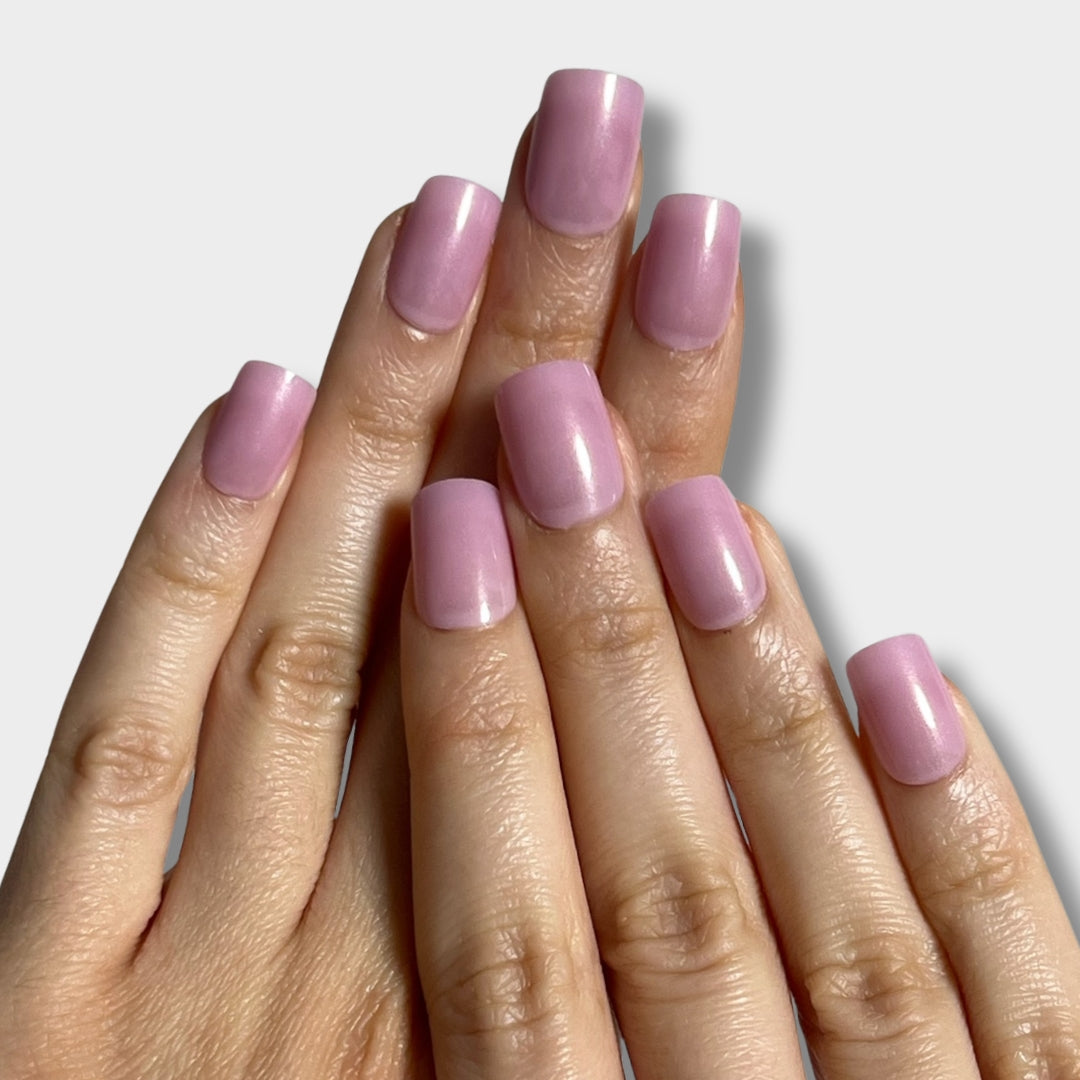 Baby Pink nail polish bottle from The Instant Nails with a glossy finish and a soft pink hue.