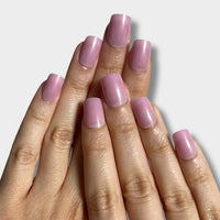 Baby Pink nail polish bottle from The Instant Nails with a glossy finish and a soft pink hue.
