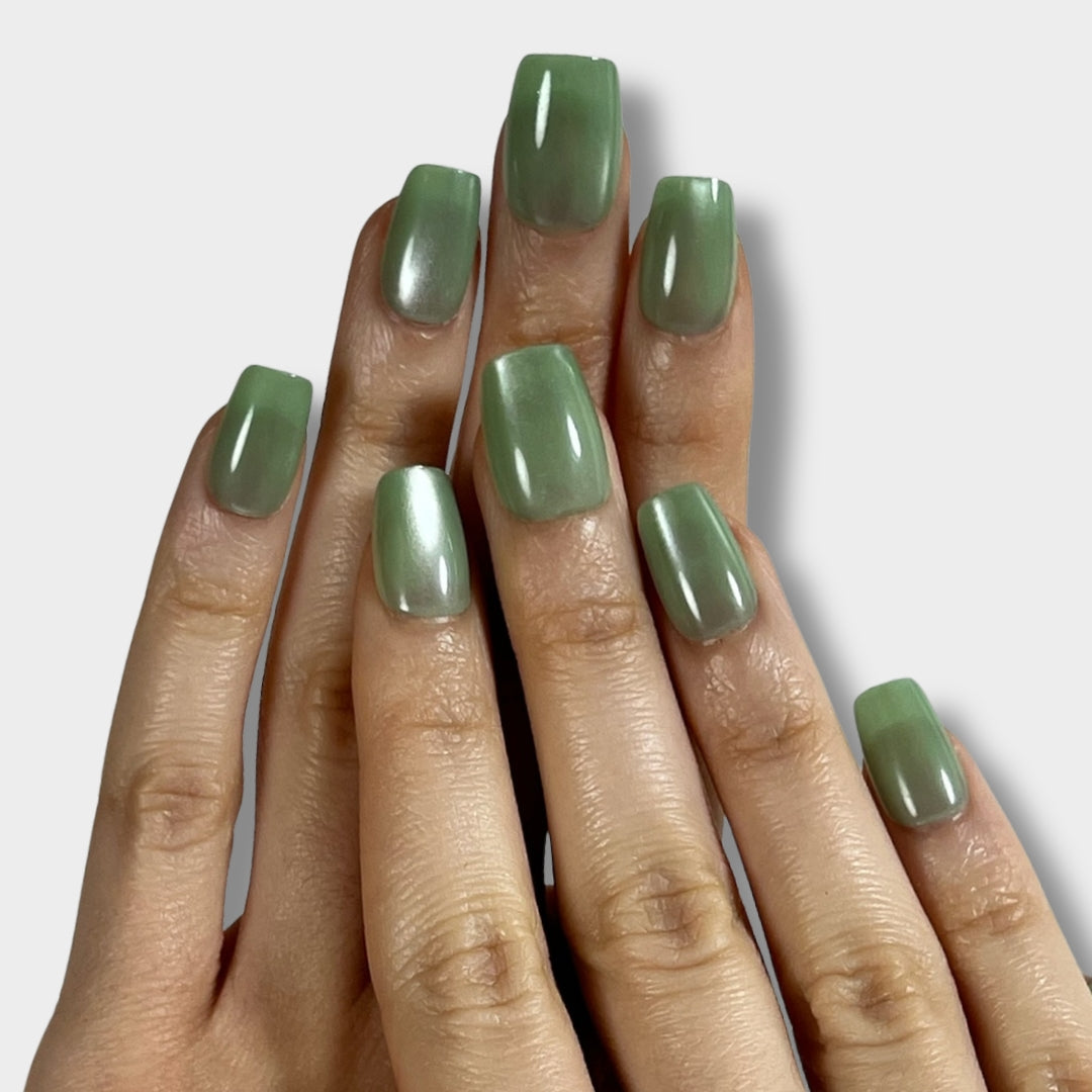 Green Leaf nail design by The Instant Nails featuring vibrant green hues and detailed leaf patterns on a stylish manicure.
