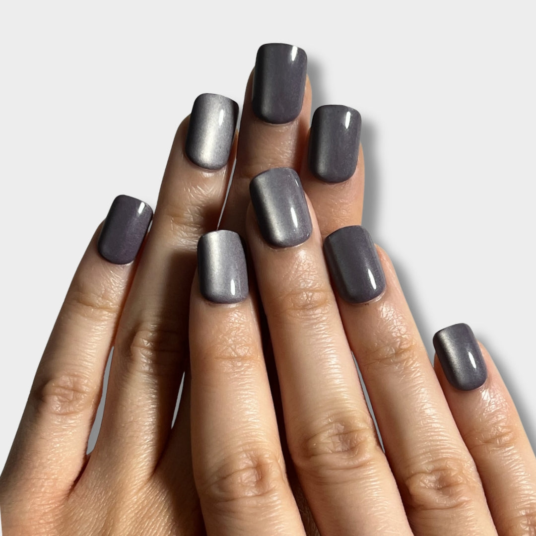 Mauve Stone nail design by The Instant Nails showcasing a smooth, elegant mauve finish on a set of artificial nails.