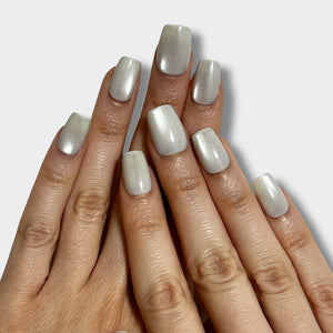 The Instant Nails Pure Glow product showcasing a radiant, natural-looking nail polish in an elegant bottle.