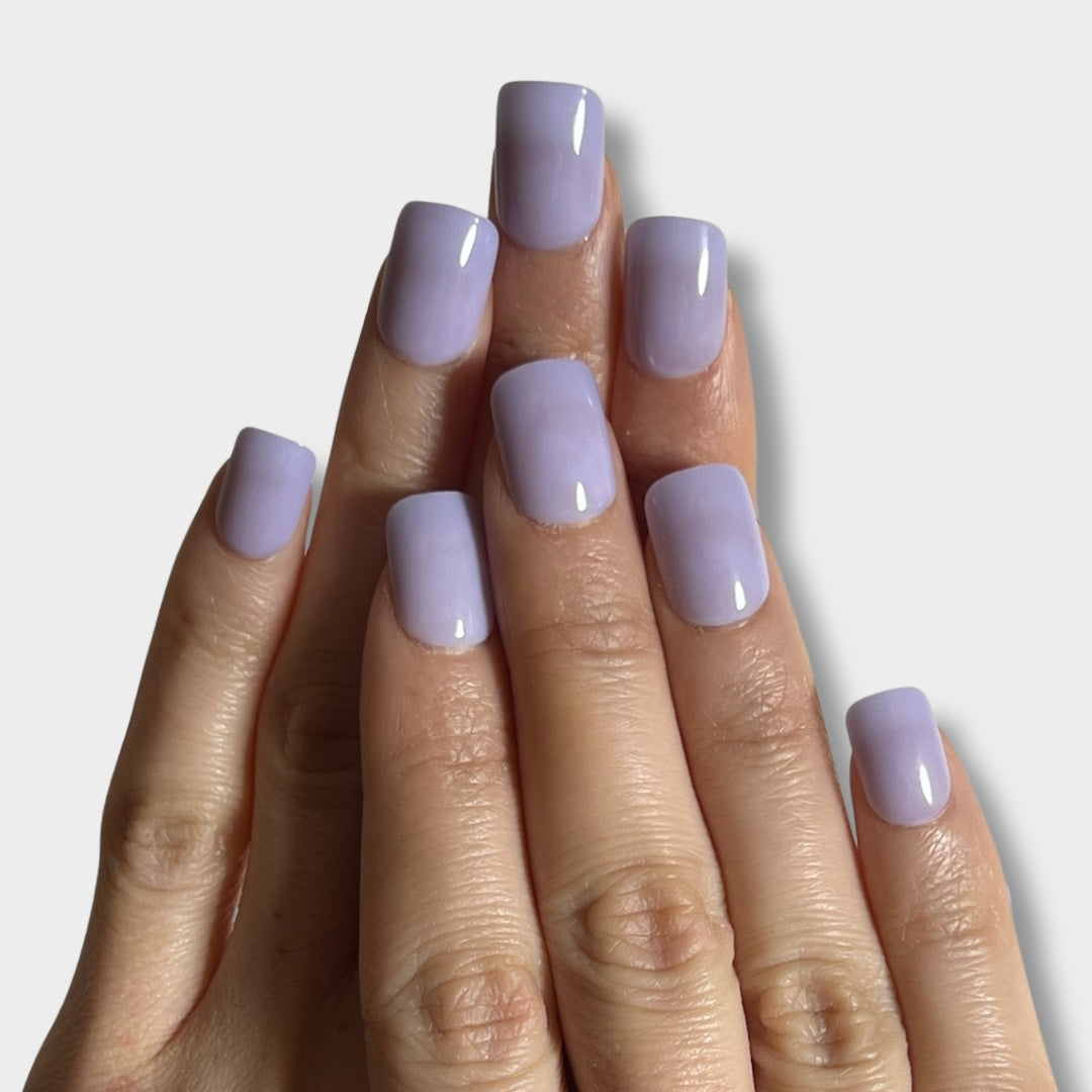 Soft Lavender nail design by The Instant Nails featuring a smooth, pastel purple finish on elegant nail tips.