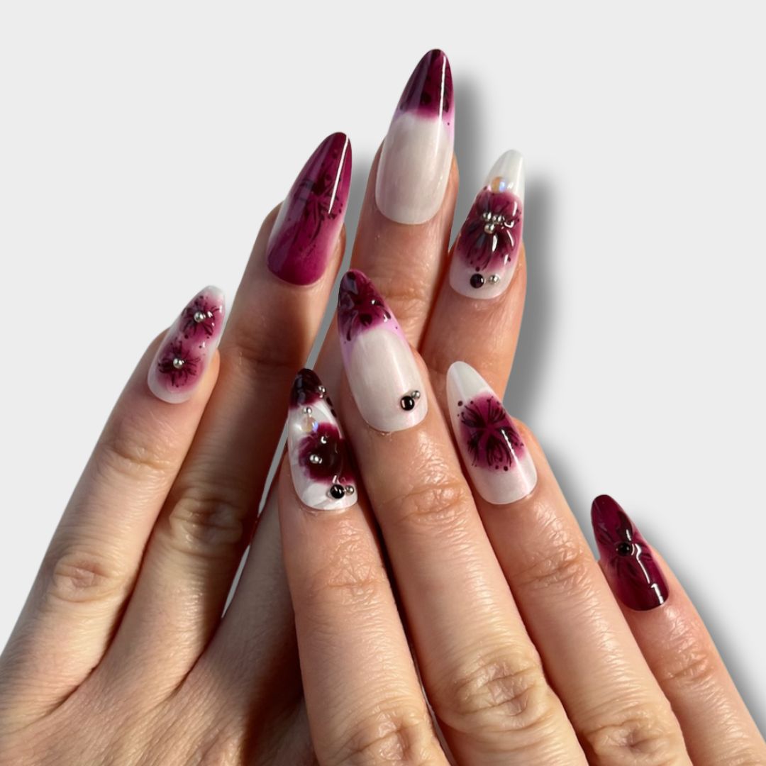 Burgundy Romance nail set by The Instant Nails featuring deep burgundy color and elegant design on long, glossy nails.
