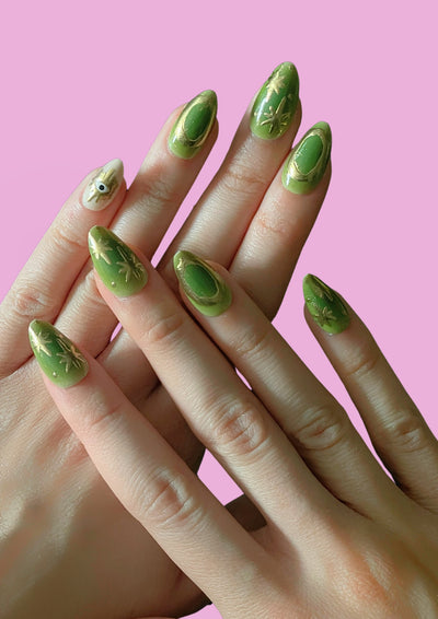 Mystic Green press on nails by Ma Boutique featuring a glossy finish and intricate designs for stylish manicured looks.