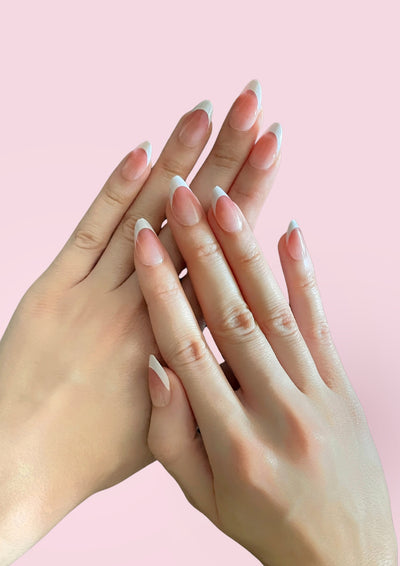 French manicure press-on nails by Ma Boutique, showcasing a classic white tip design on elegant nude base.